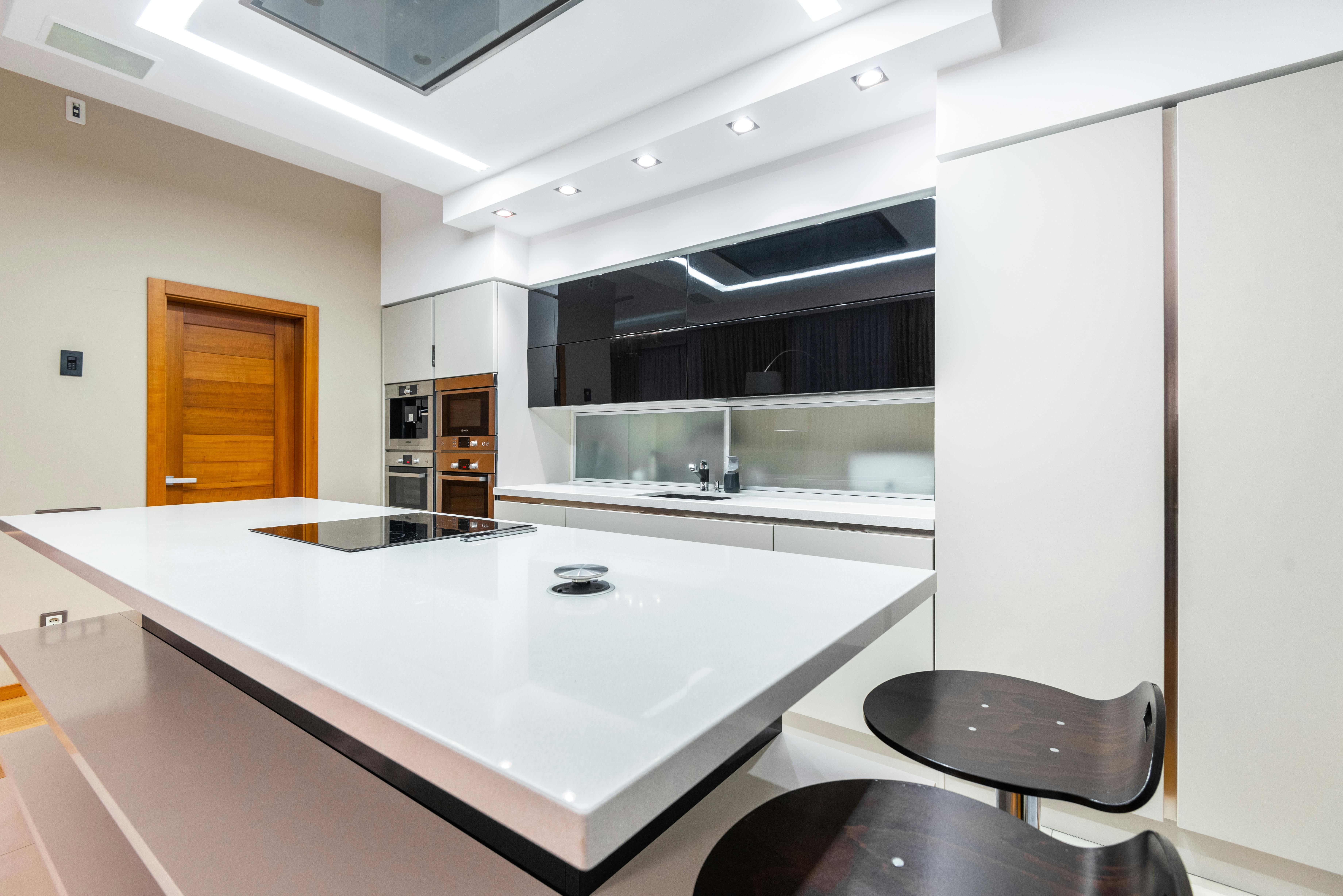 a kitchen lit up with LED lights