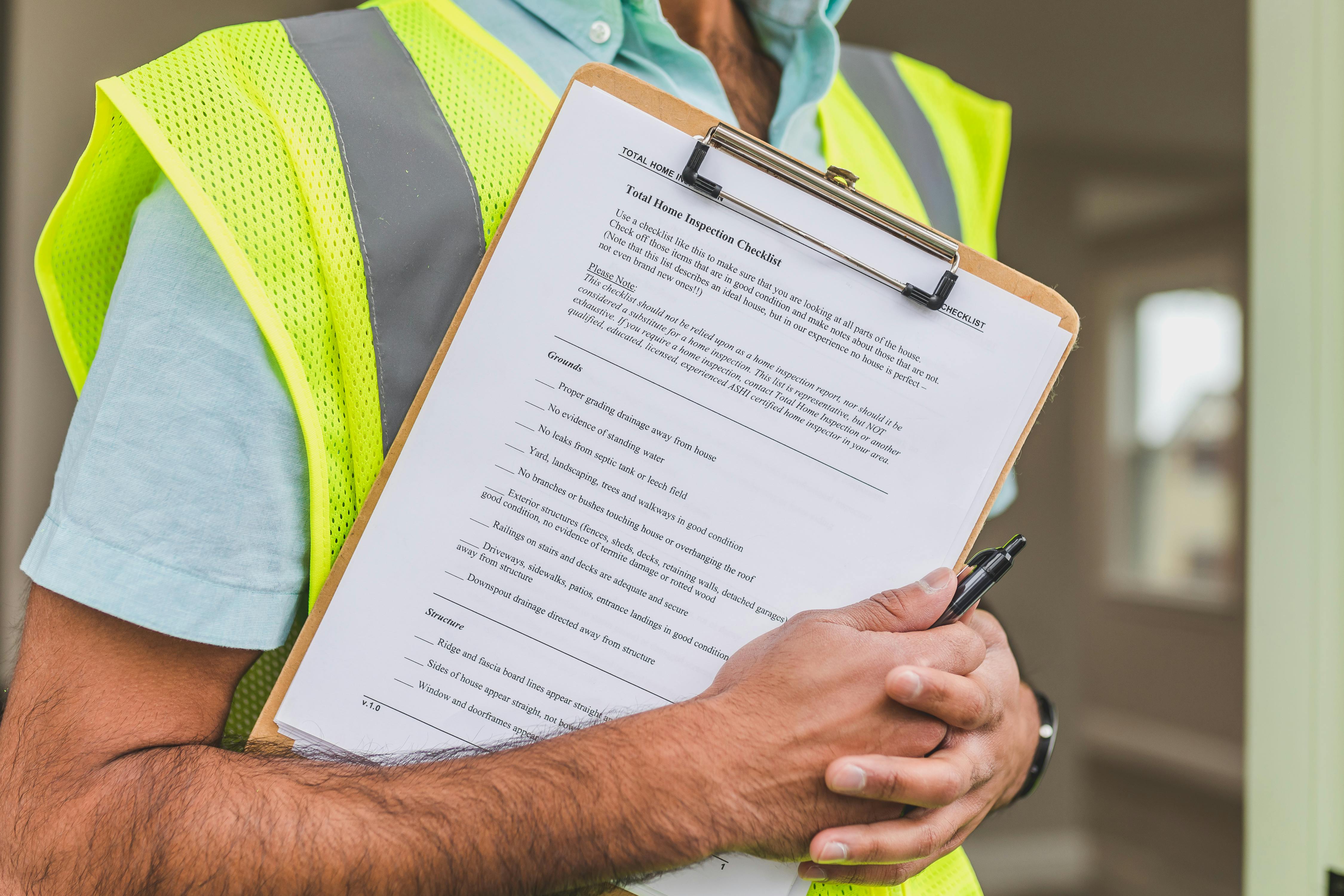 an electrician with a safety check list